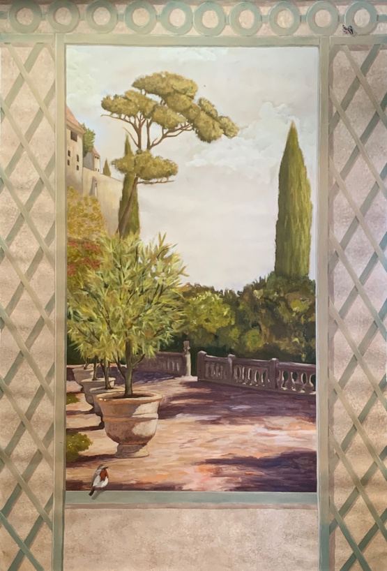 Décor peint d'un jardin méditerranéen encadré d'un treillage en trompe-l'œil